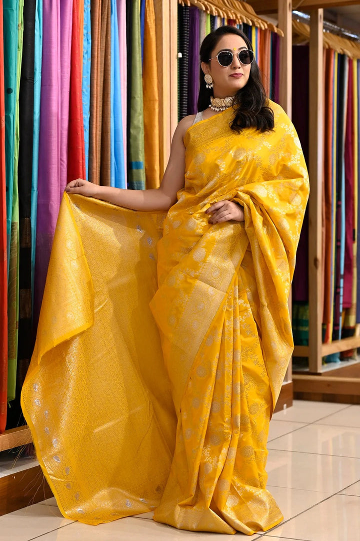 Party Wear Yellow Color Banarasi Silk Saree With Meena Work