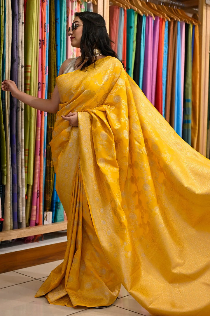 Party Wear Yellow Color Banarasi Silk Saree With Meena Work