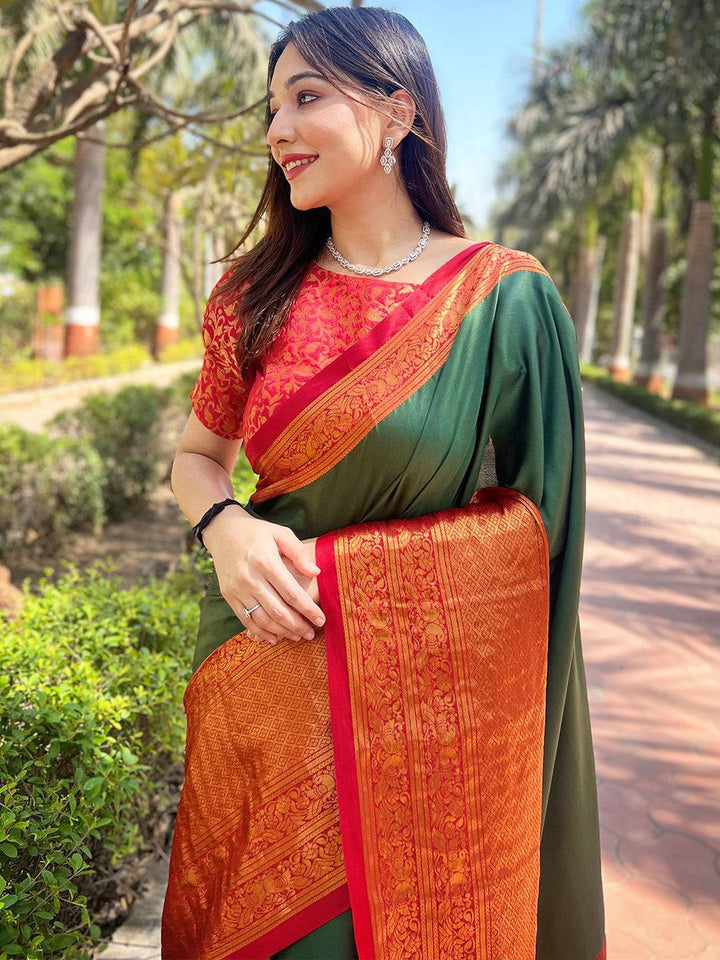 Bottle Green Kanjivaram Silk Saree with Rich Orange Zari Border & Contrast Pallu