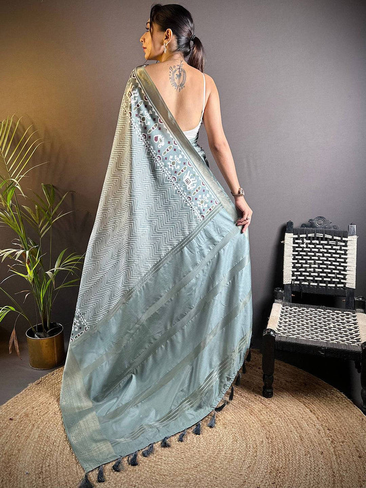 Pastel Green Ikat Printed Soft Silk Saree with Silver Zari Border & Pallu