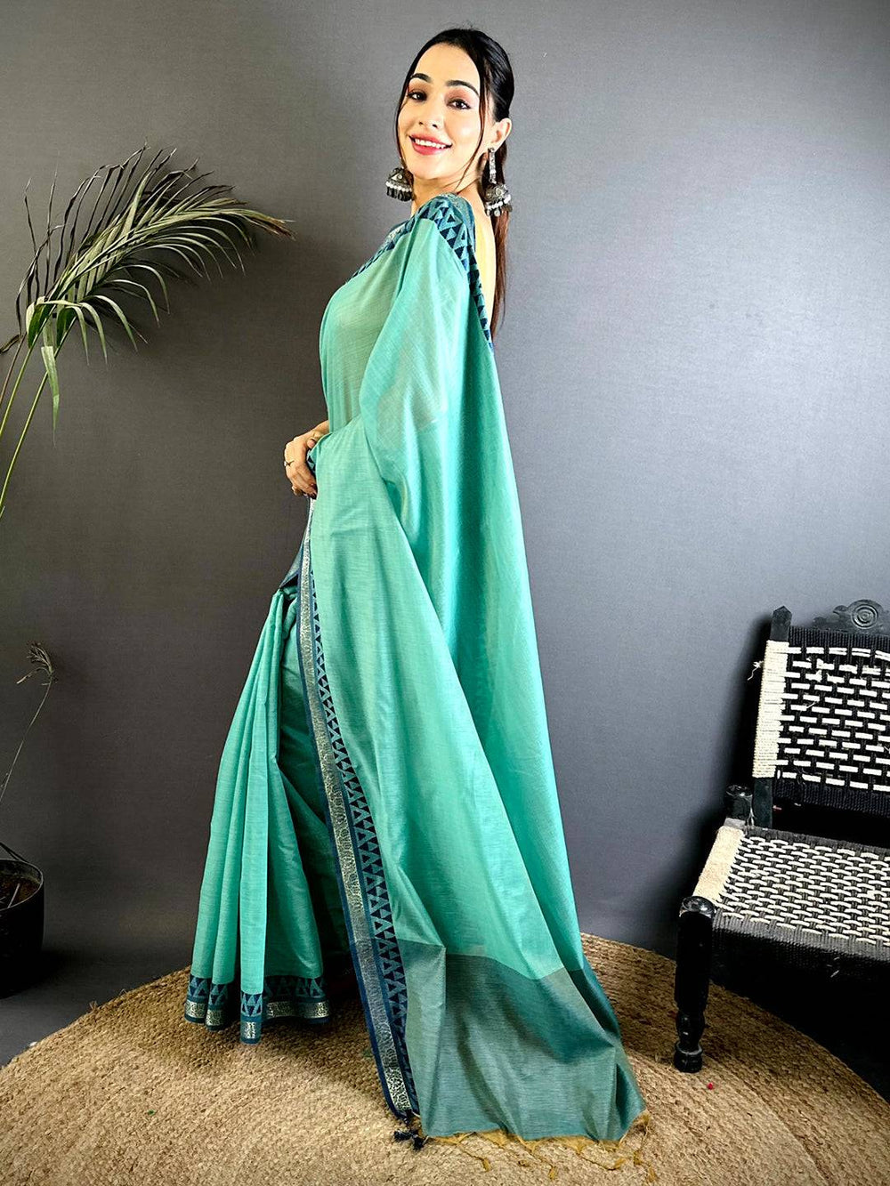 Mint Green Linen Soft Silk Saree with Blue Geometric Border & Tassels
