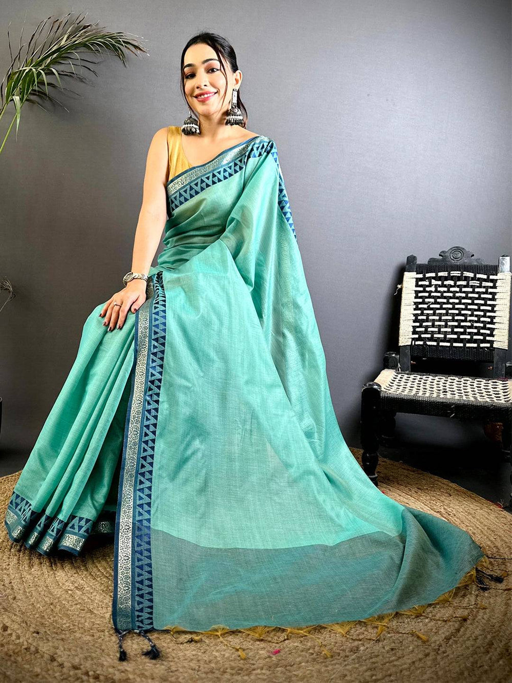 Mint Green Linen Soft Silk Saree with Blue Geometric Border & Tassels