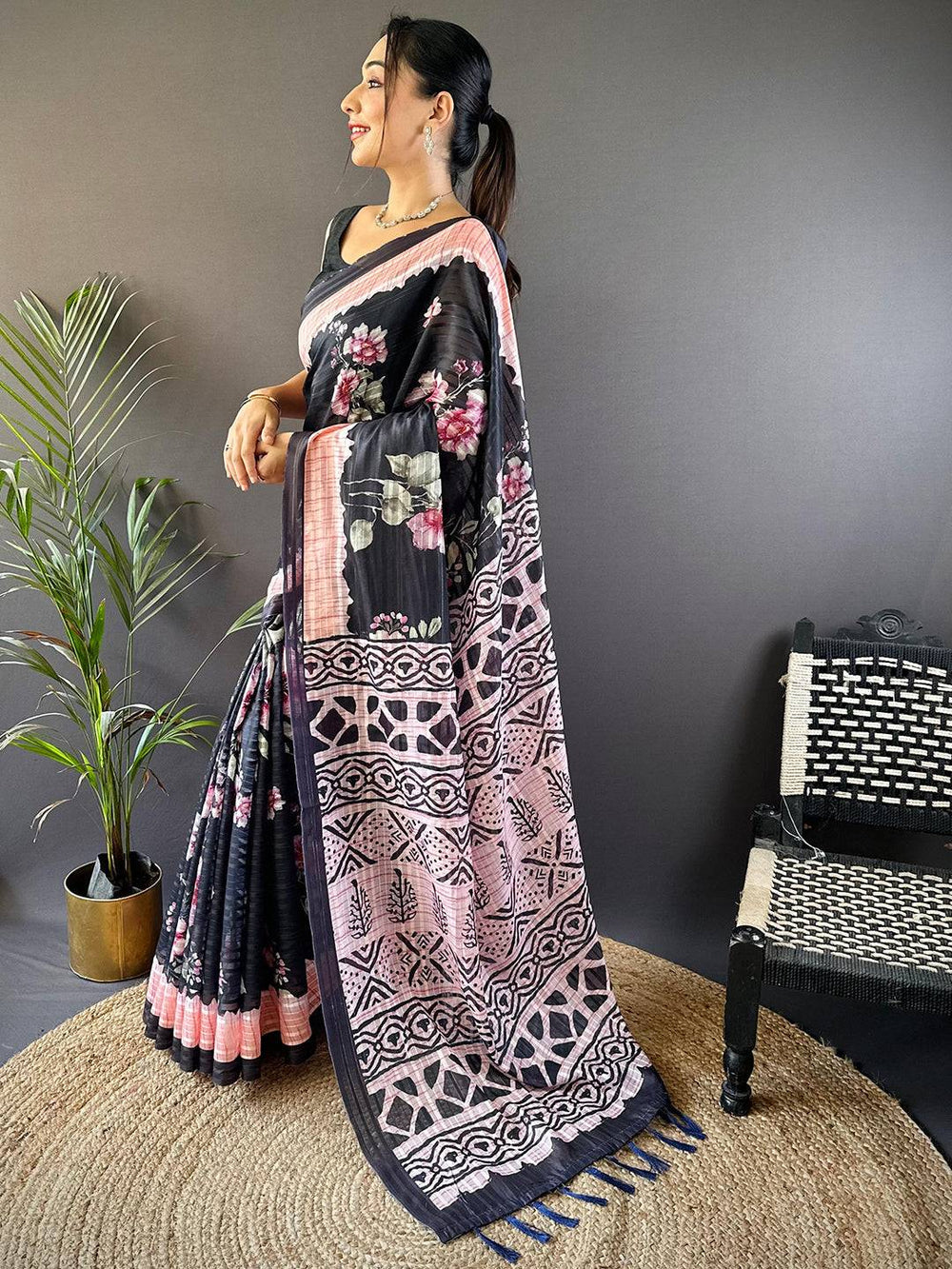 Black Linen Soft Silk Saree with Pink Floral Print & Tribal Pattern Pallu