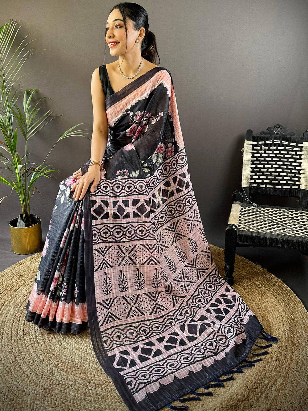 Black Linen Soft Silk Saree with Pink Floral Print & Tribal Pattern Pallu