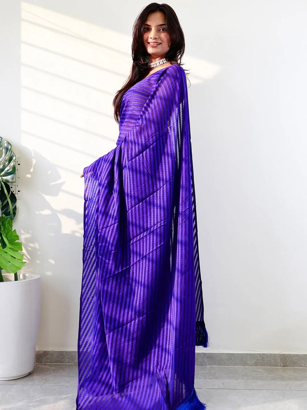Royal Blue Pleated Organza Saree with Self Stripe Texture & Feather Tassel Border