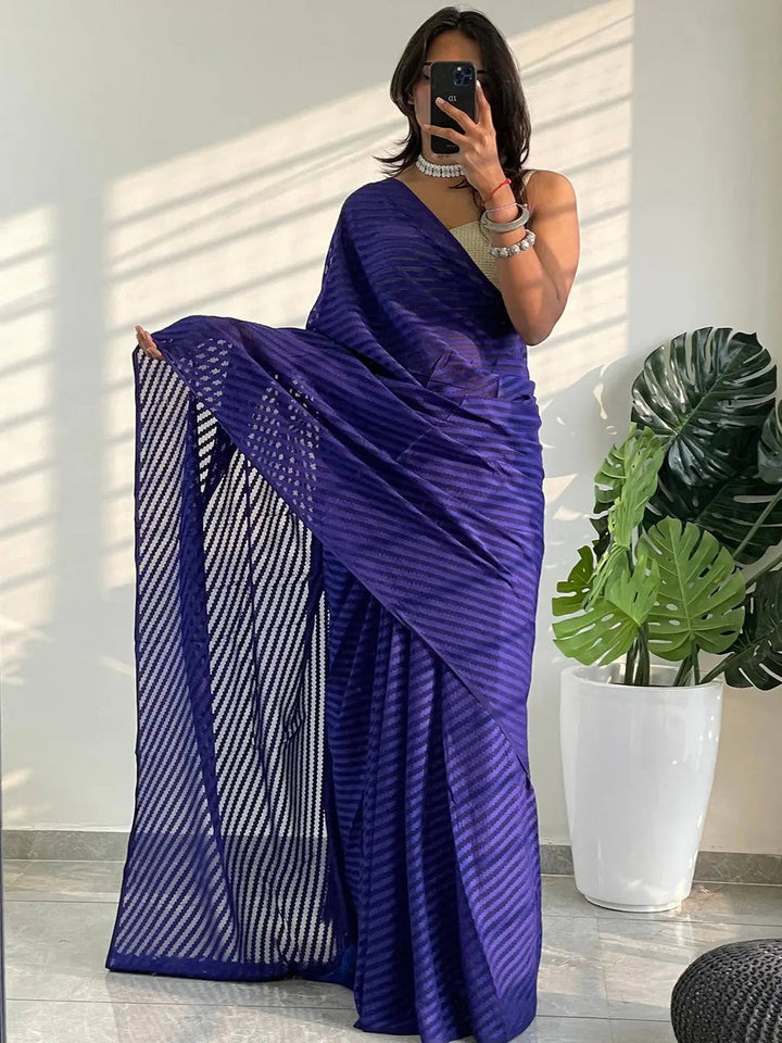 Royal Blue Pleated Organza Saree with Self Stripe Texture & Feather Tassel Border