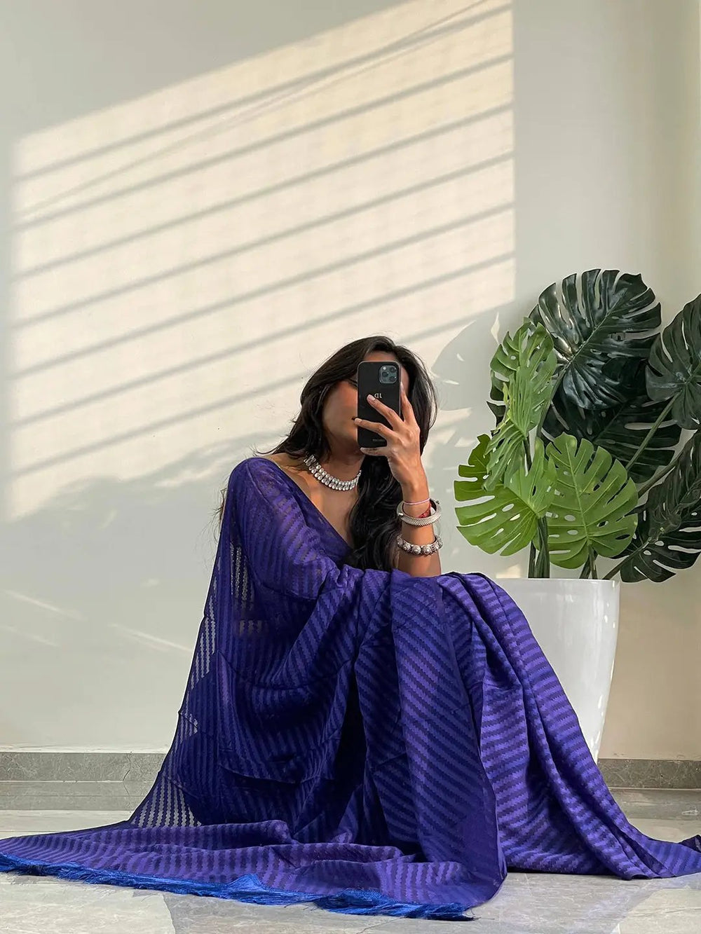 Royal Blue Pleated Organza Saree with Self Stripe Texture & Feather Tassel Border