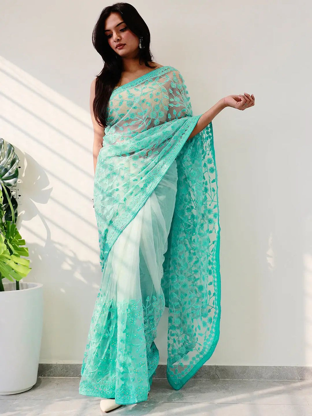 Mint Green Net Saree with Heavy Floral Embroidery & Scalloped Border