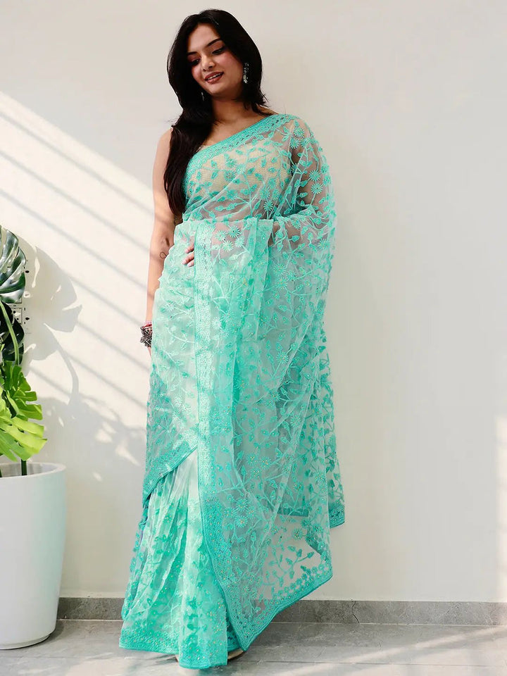 Mint Green Net Saree with Heavy Floral Embroidery & Scalloped Border