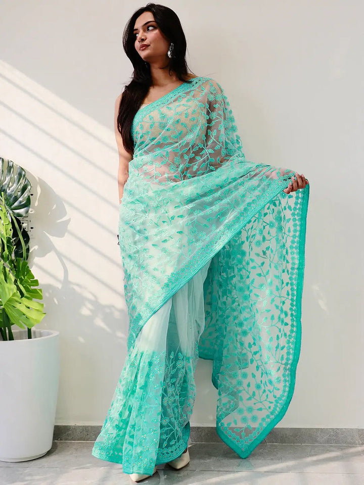 Mint Green Net Saree with Heavy Floral Embroidery & Scalloped Border