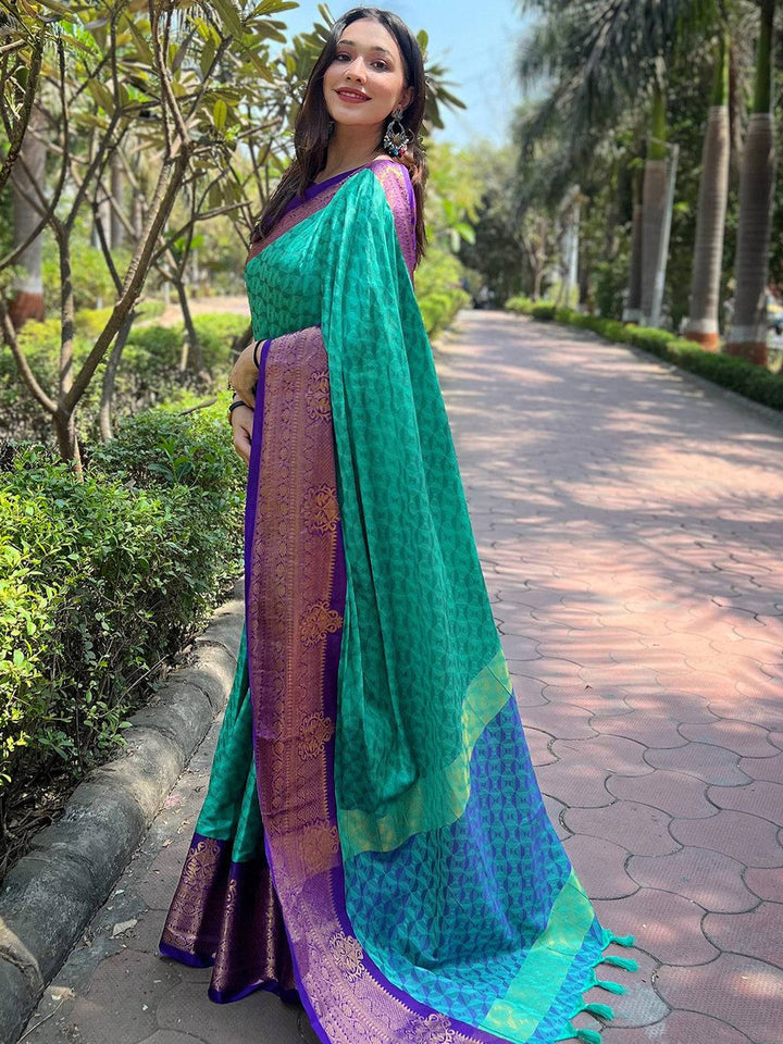 Turquoise Banarasi Silk Saree with Purple Zari Border & Geometric Weaving