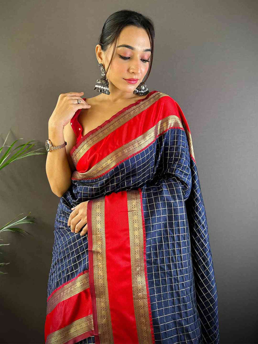 Navy Blue Banarasi Silk Saree with Golden Zari Weaving & Red Border
