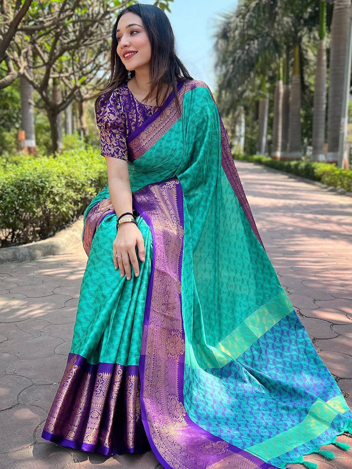 Turquoise Banarasi Silk Saree with Purple Zari Border & Geometric Weaving