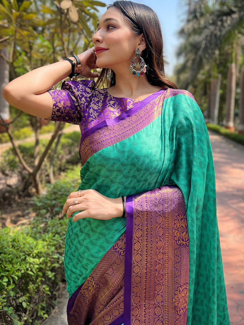 Turquoise Banarasi Silk Saree with Purple Zari Border & Geometric Weaving