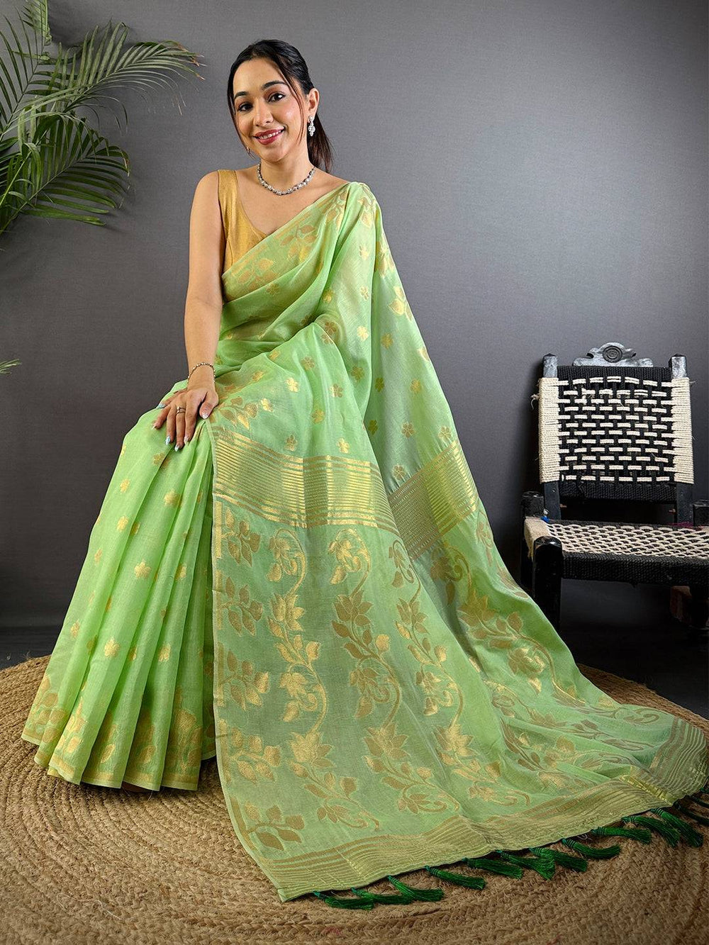Light Green Banarasi Soft Silk Saree with Gold Zari Floral Weaving & Tassel Pallu