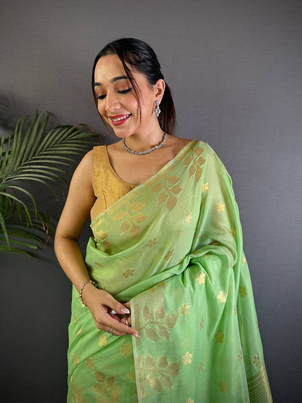 Light Green Banarasi Soft Silk Saree with Gold Zari Floral Weaving & Tassel Pallu